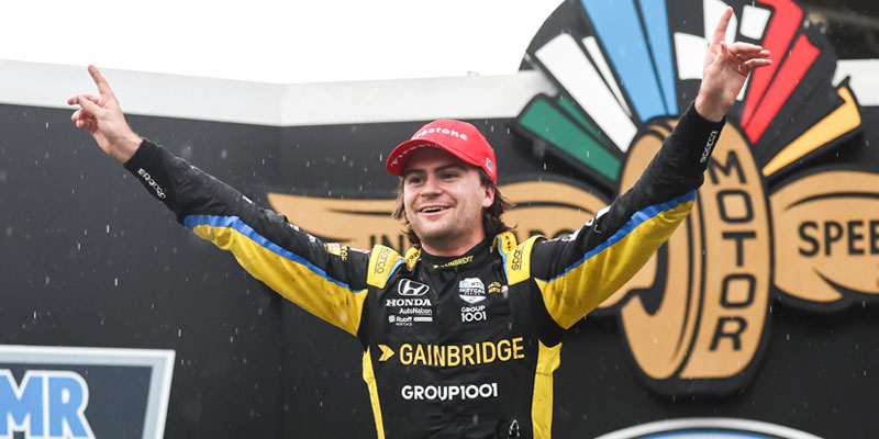 Colton Herta celebrates in victory lane of the 2022 Grand Prix