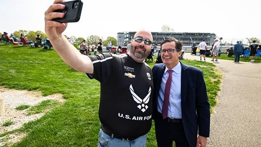 IMS Track President Doug Boles poses for a picture with a fan. - Indianapolis 500 Open Test - By: James Black