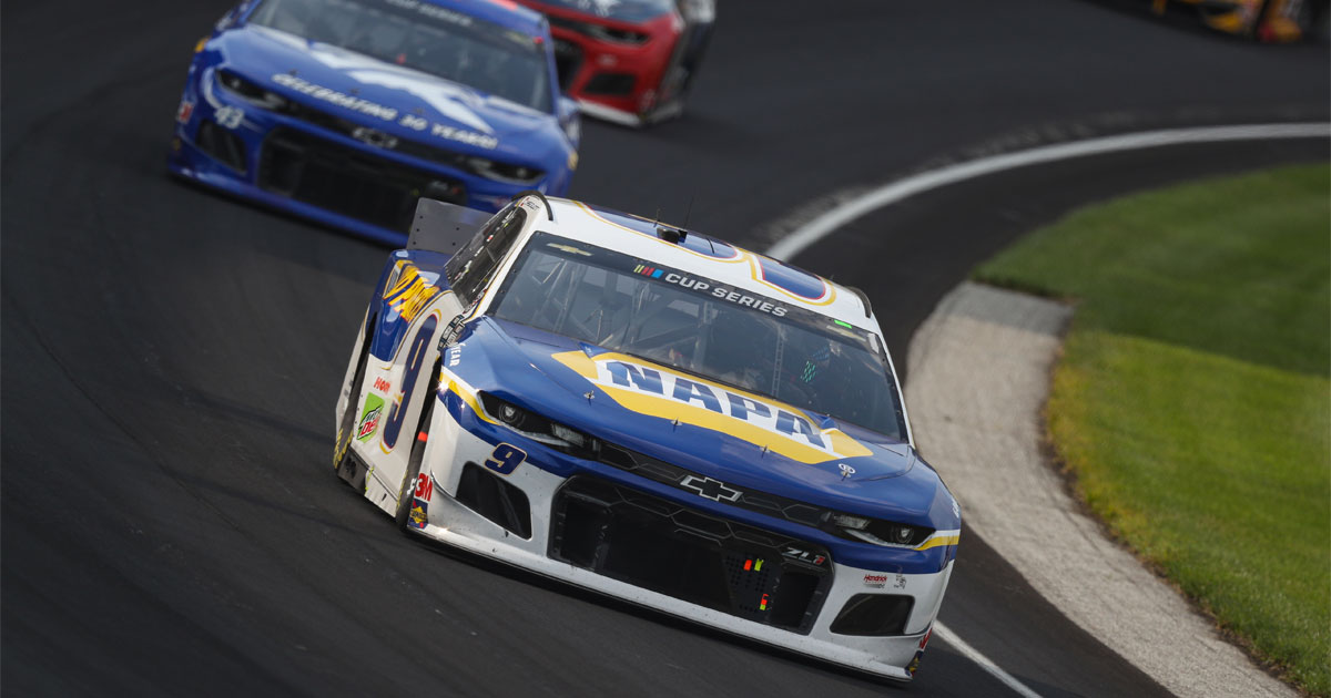 Chase Elliott leads Bubba Wallace and others through the turn at Indianapolis Motor Speedway in the 2020 Brickyard 400