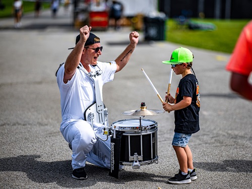 A child plays the drums