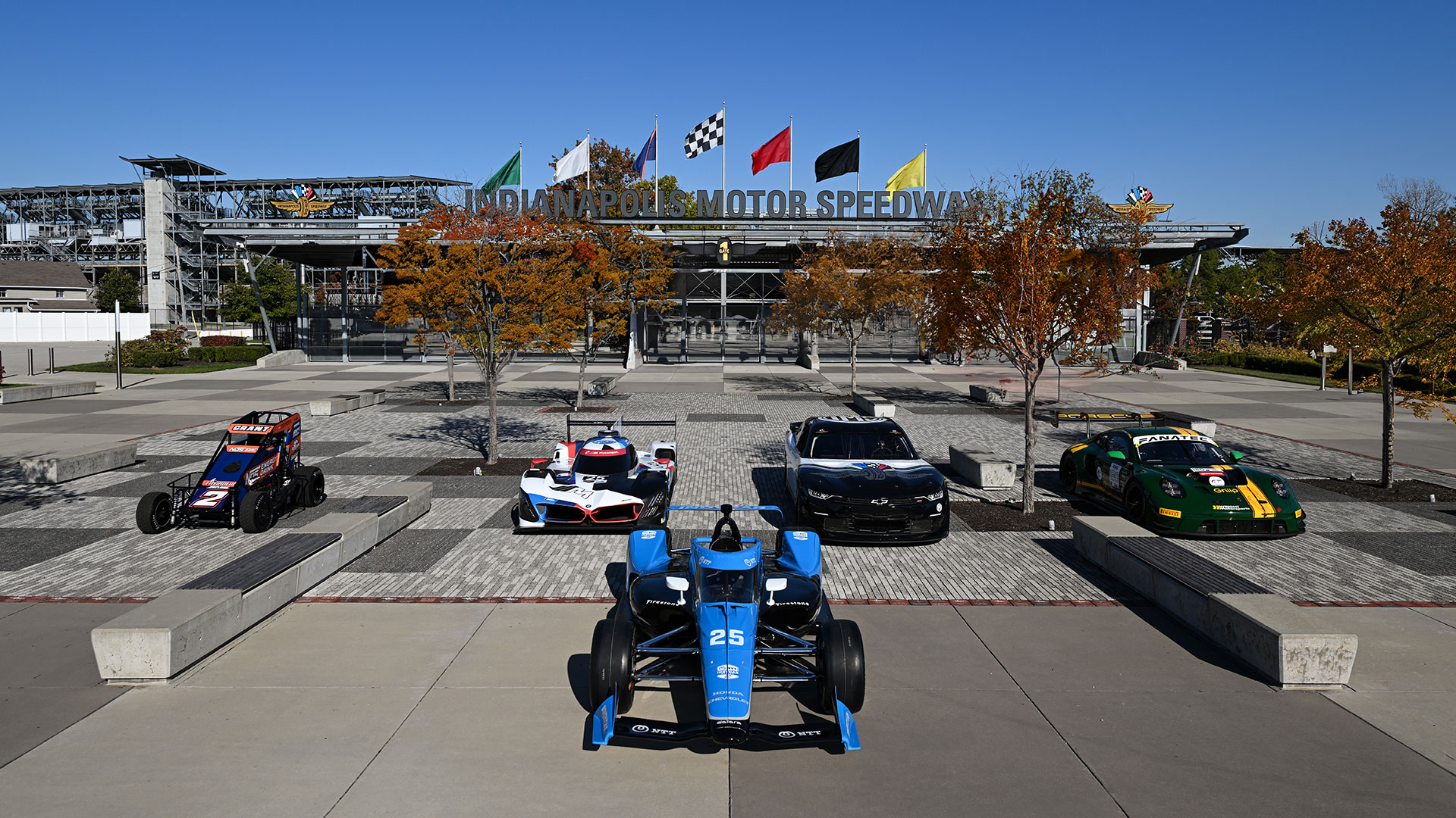 Cars representing all of the series that compete at Indianapolis Motor Speedway in front of Gate 1