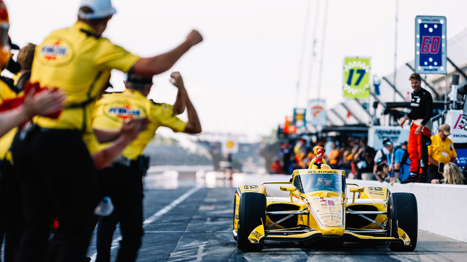 Scott McLaughlin's team celebrates after qualifying on pit road