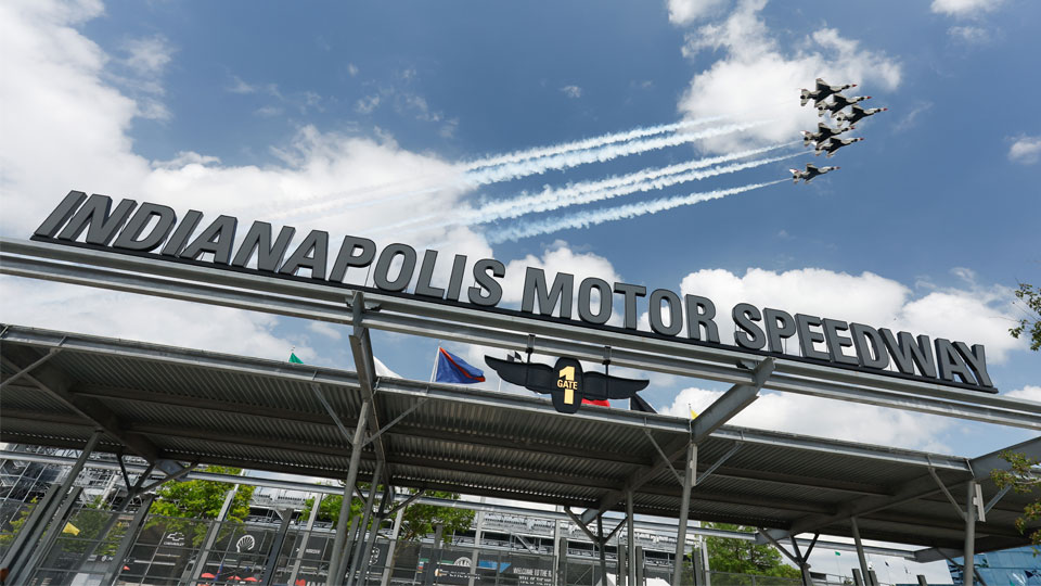 The Thunderbirds in formation over Gate 1 at Indianapolis Motor Speedway