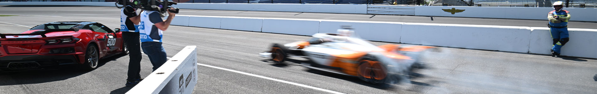 TV crew follows a car leaving pit road to begin a qualifying run