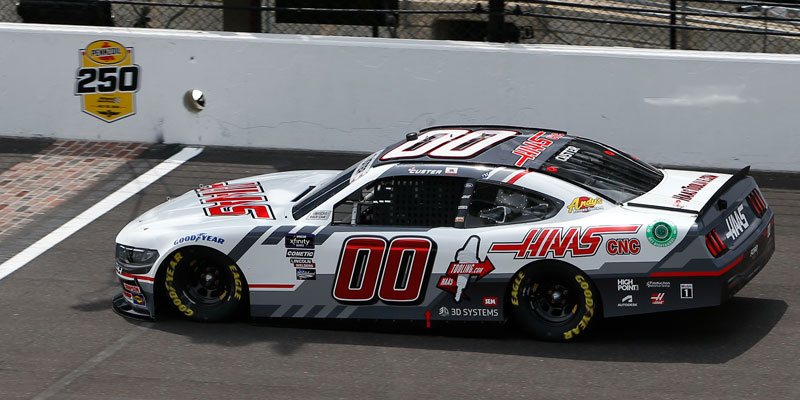 Cole Custer crosses the Yard of Bricks in the 00 car at Indianapolis Motor Speedway.