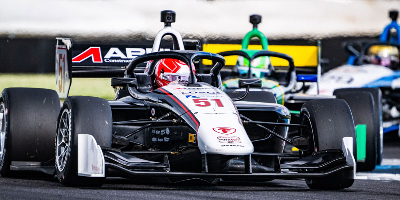 Jacob Abel navigates a turn in the 51 car while being followed by two other cars