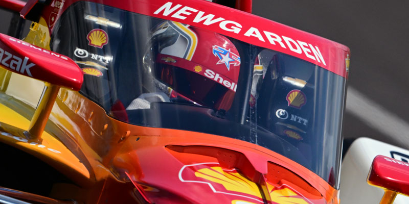 A close-up shot of Josef Newgarden turning his car while on track at Indianapolis Motor Speedway