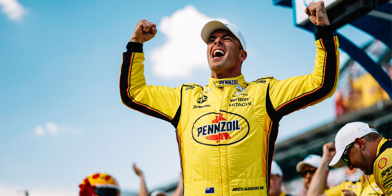 Scott McLaughlin celebrates on pit road after setting fast time on Sunday